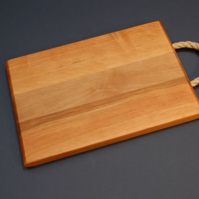 Cutting board with a rope